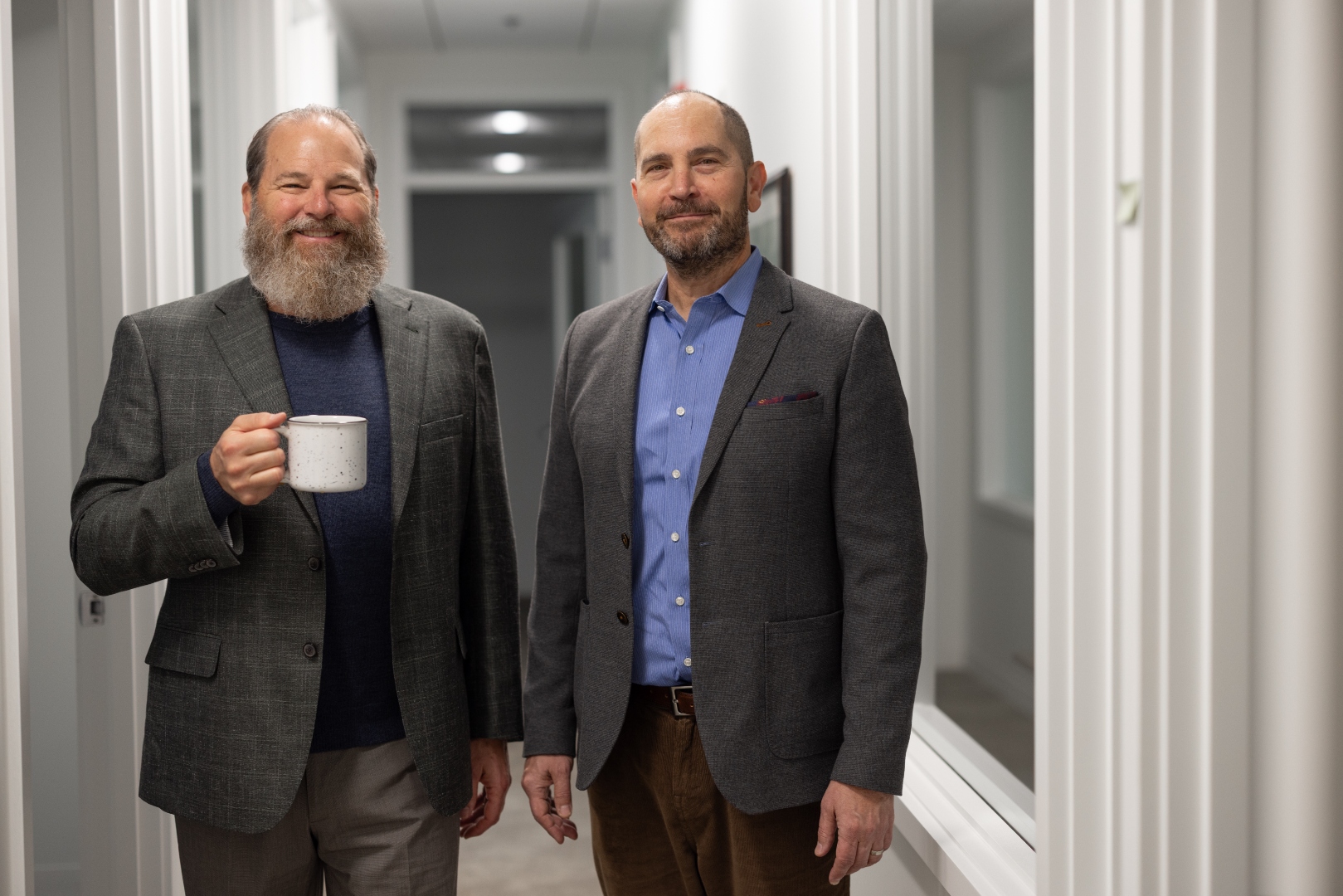 Professionals in the Soaring Suites hallway